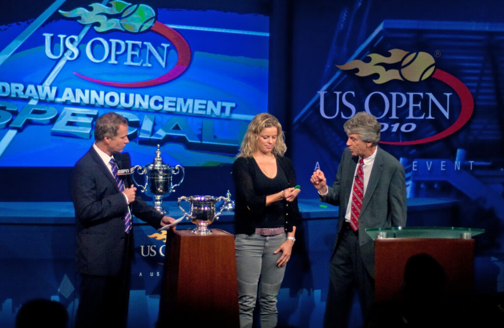 Patrick McEnroe_KIm_Clijsters_and_US_Open_Tournament_Director_Brian_Early_check_spelling_during_the_US_Open_Draw_Announcement_Show
